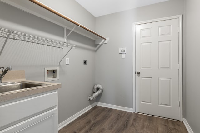 laundry room featuring hookup for a washing machine, dark hardwood / wood-style floors, electric dryer hookup, and sink