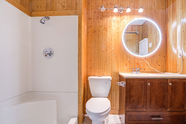 bathroom featuring tile patterned floors and wood walls