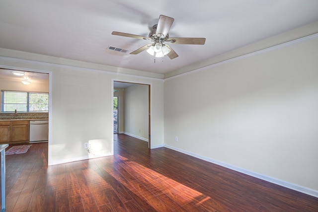 unfurnished room with ceiling fan, dark wood-type flooring, and sink