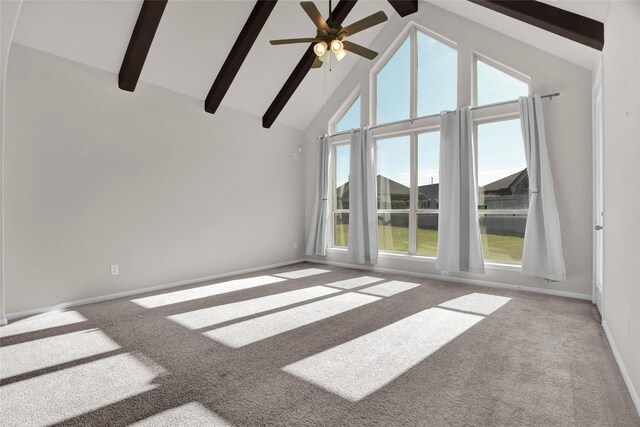 additional living space with beamed ceiling, carpet floors, high vaulted ceiling, and plenty of natural light