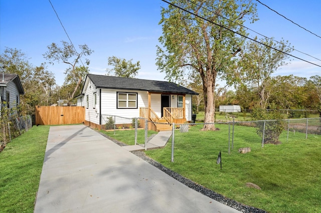 bungalow with a front lawn