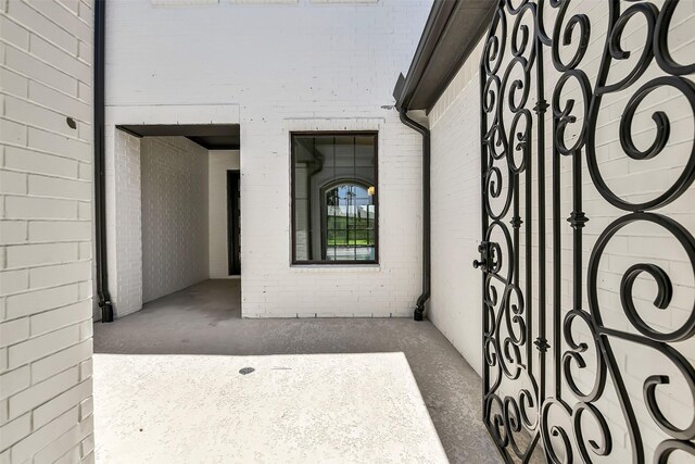 12926 Whitewater Way, Conroe, TX 77302 - doorway to property with brick siding