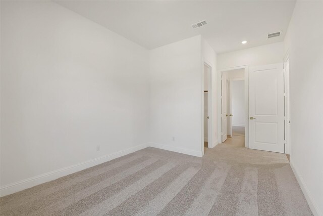 12926 Whitewater Way, Conroe, TX 77302 - spare room featuring light colored carpet and recessed lighting