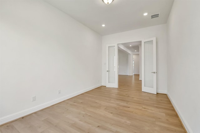 12926 Whitewater Way, Conroe, TX 77302 - unfurnished room with light wood finished floors and recessed lighting