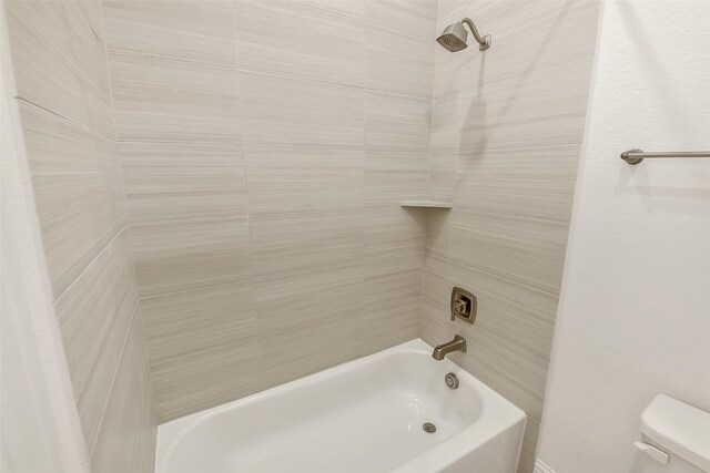 12926 Whitewater Way, Conroe, TX 77302 - full bathroom featuring bathtub / shower combination and toilet