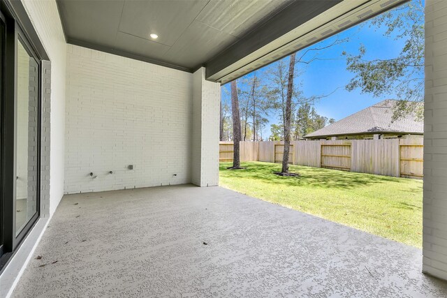12926 Whitewater Way, Conroe, TX 77302 - fenced backyard with a patio