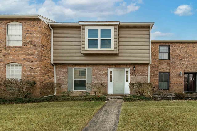 view of front facade with a front lawn