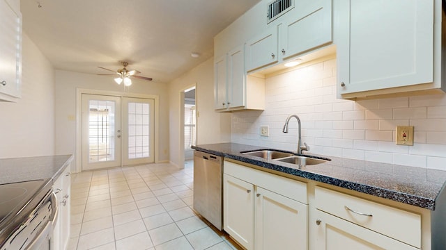 kitchen with french doors, sink, ceiling fan, appliances with stainless steel finishes, and white cabinetry