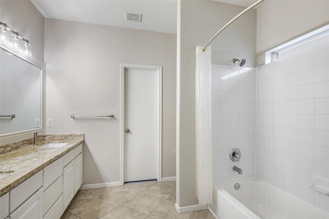 bathroom featuring shower / tub combo with curtain, vanity, and tile patterned flooring