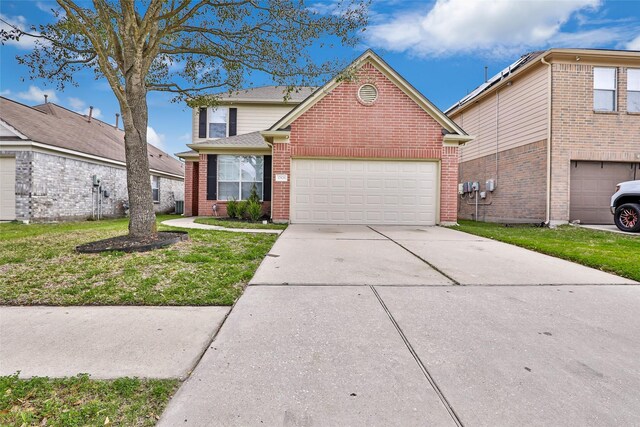 traditional-style house featuring a garage, concrete driveway, brick siding, and a front lawn