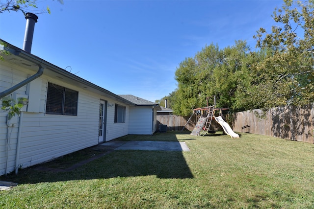 view of yard with a playground