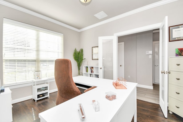 home office with dark hardwood / wood-style floors, ornamental molding, and french doors