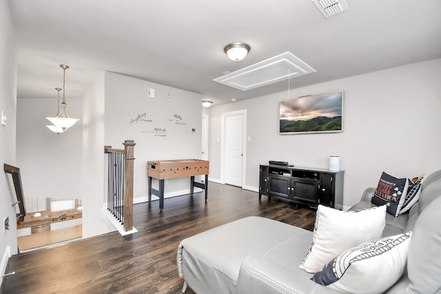 living room featuring dark wood-type flooring