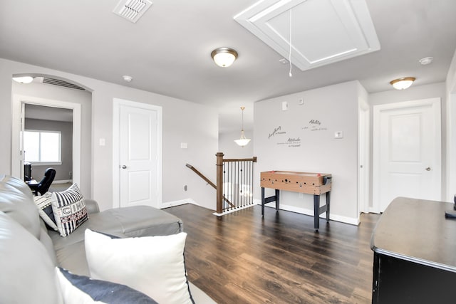 living room with dark wood-type flooring