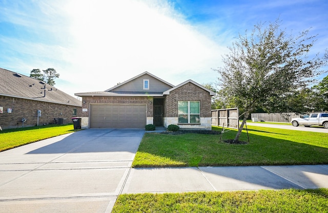 view of front of house with a garage and a front yard