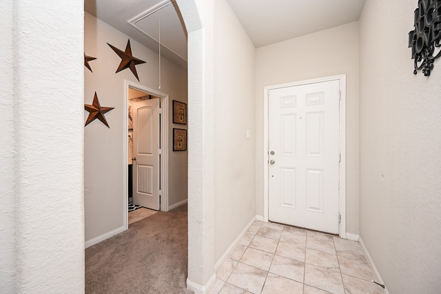 interior space featuring light colored carpet