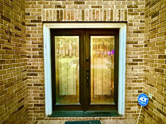 property entrance featuring french doors