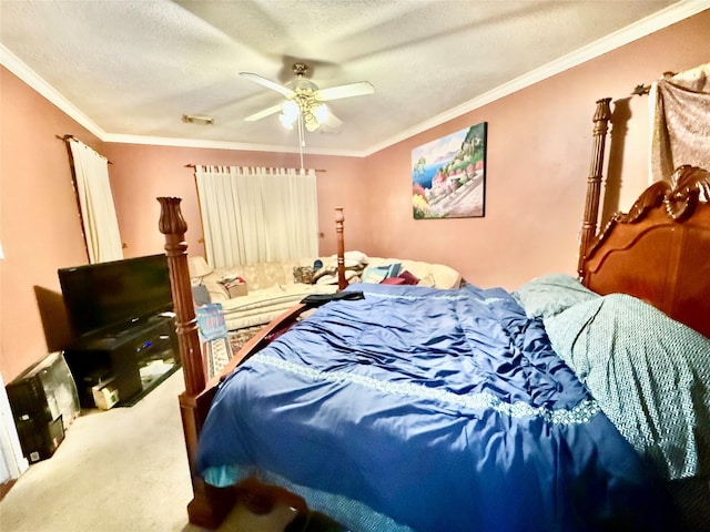 carpeted bedroom featuring ceiling fan, ornamental molding, and a textured ceiling