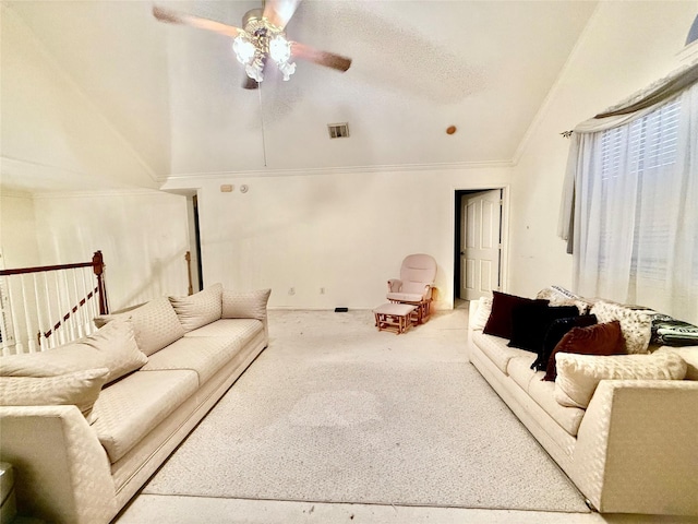 living room featuring a textured ceiling, ceiling fan, and lofted ceiling