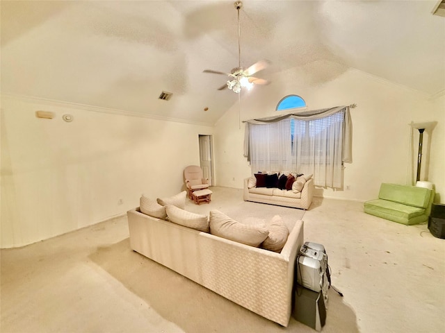 carpeted living room featuring ceiling fan, ornamental molding, and vaulted ceiling