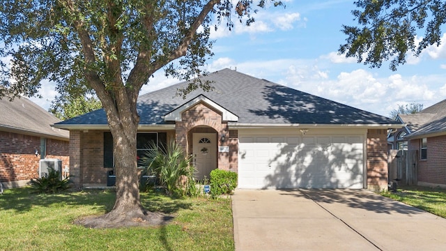 single story home featuring a front yard, a garage, and cooling unit