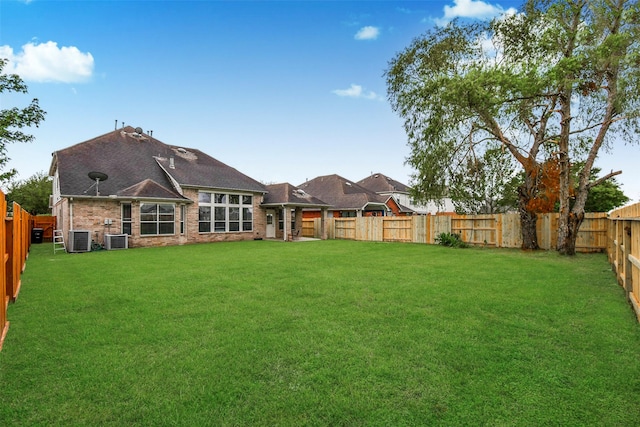 view of yard with central AC