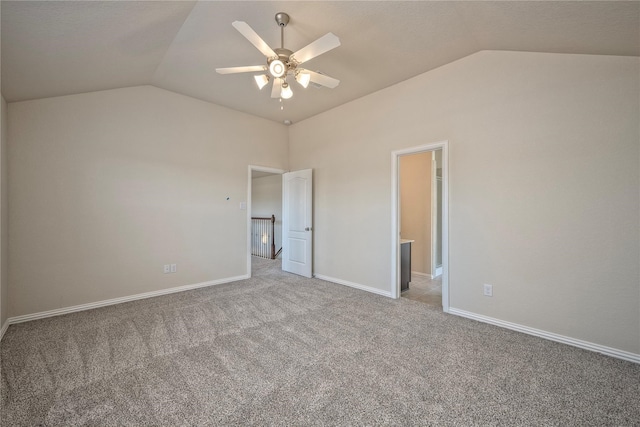 unfurnished bedroom with ceiling fan, light carpet, and lofted ceiling