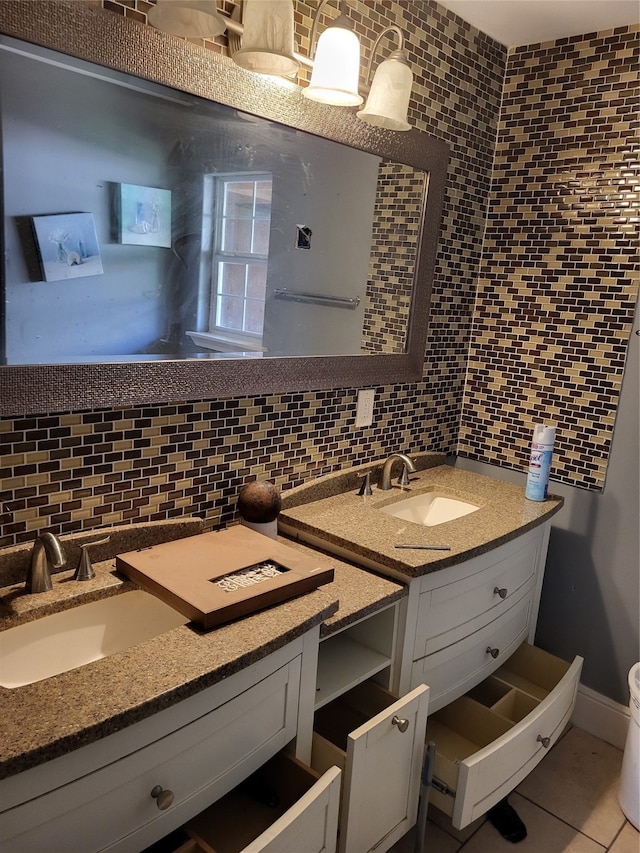 bathroom with decorative backsplash and vanity