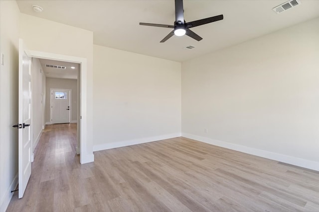 unfurnished room featuring ceiling fan and light hardwood / wood-style flooring