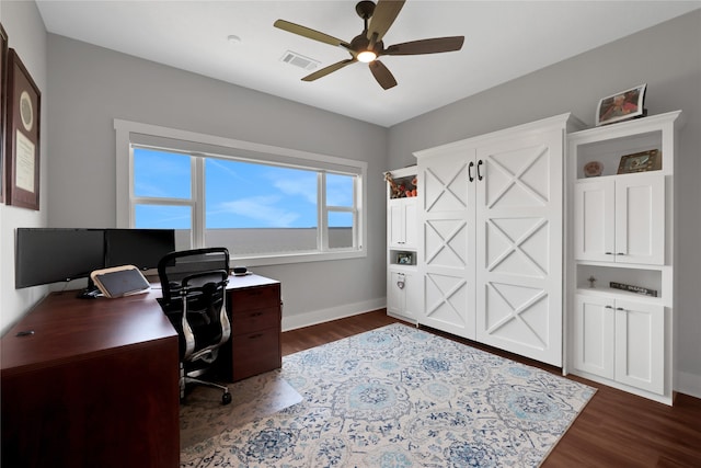 office space featuring ceiling fan and dark wood-type flooring