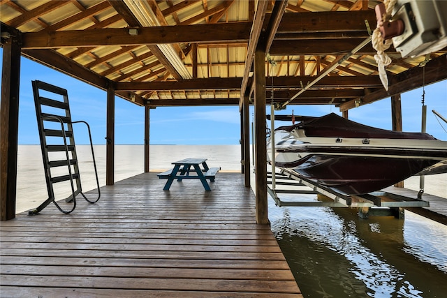 dock area with a water view