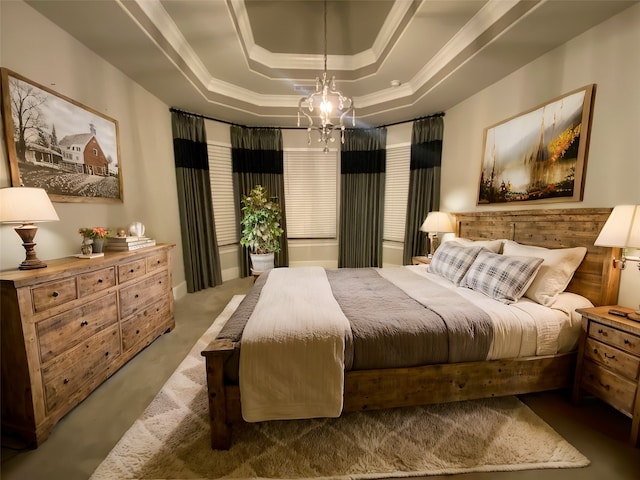 bedroom featuring a notable chandelier, carpet floors, and a tray ceiling