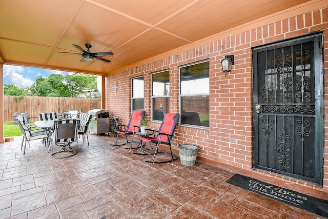 view of patio / terrace featuring ceiling fan