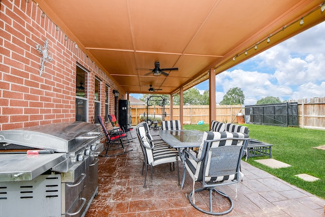 view of patio / terrace with grilling area and ceiling fan