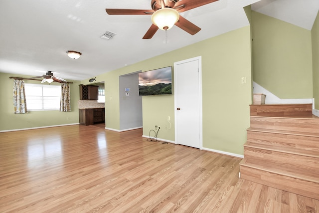 unfurnished living room featuring light hardwood / wood-style flooring