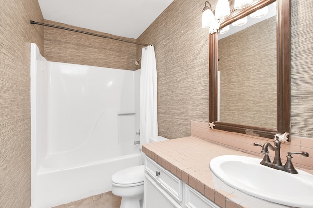 full bathroom featuring tasteful backsplash, tile patterned floors, toilet, shower / bath combo with shower curtain, and vanity