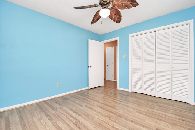 unfurnished bedroom featuring a closet, ceiling fan, and light hardwood / wood-style flooring