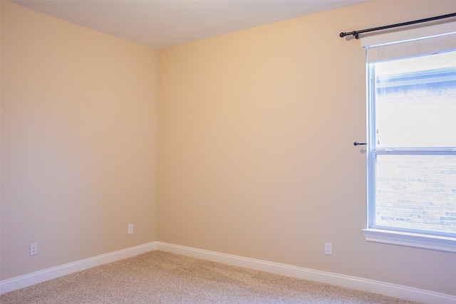 empty room with carpet flooring