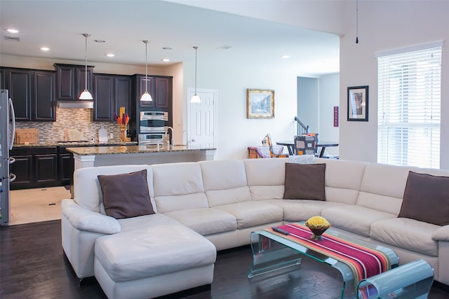 living room with dark wood-type flooring