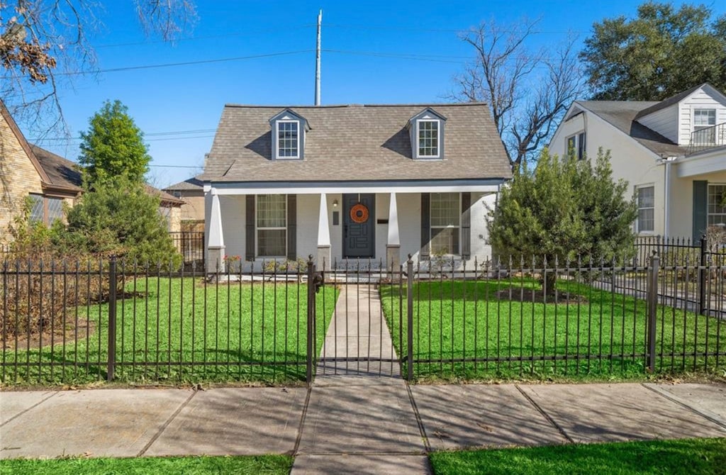 cape cod-style house with a porch