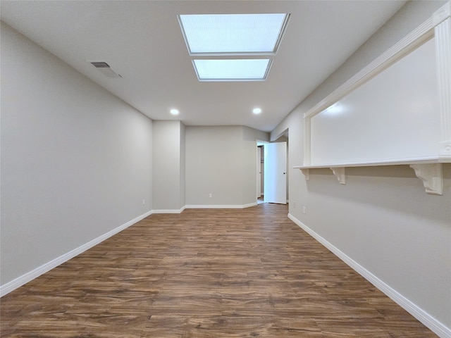 basement with dark wood-type flooring