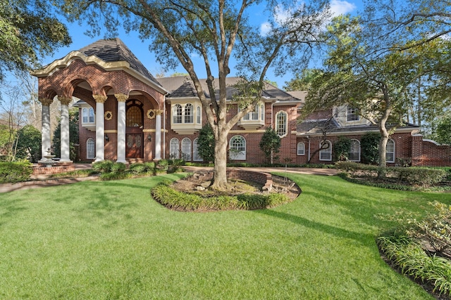 view of front of home with a front yard