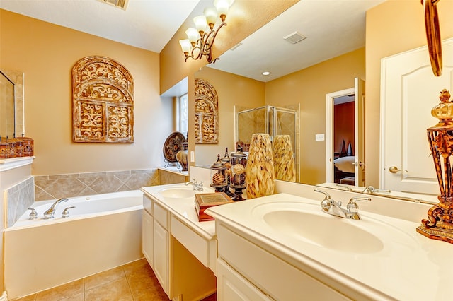 bathroom featuring tile patterned floors, vanity, and independent shower and bath