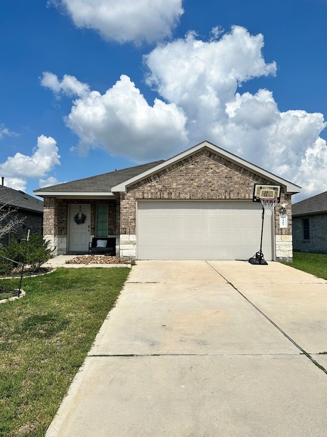 single story home featuring a front yard and a garage