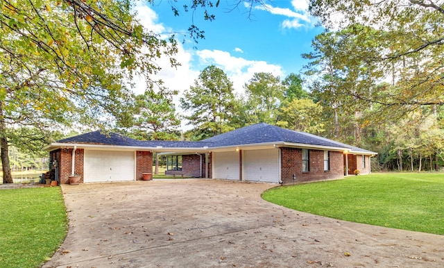 ranch-style home with a front lawn and a garage