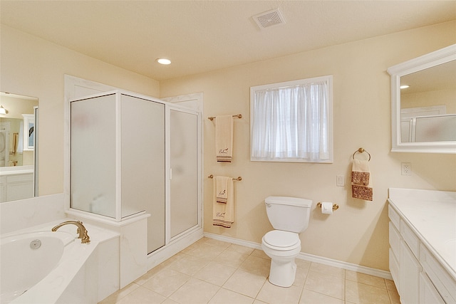 full bathroom with toilet, vanity, tile patterned floors, and independent shower and bath