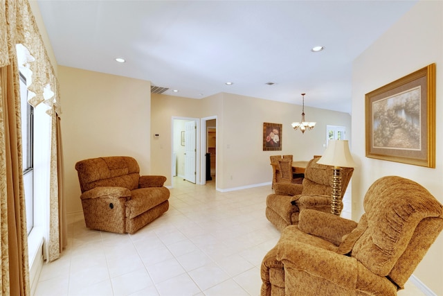 living room with a healthy amount of sunlight and an inviting chandelier