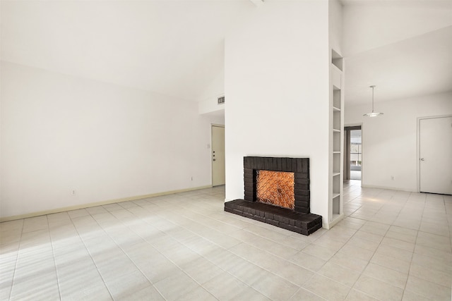 unfurnished living room with a fireplace, built in shelves, high vaulted ceiling, and light tile patterned flooring