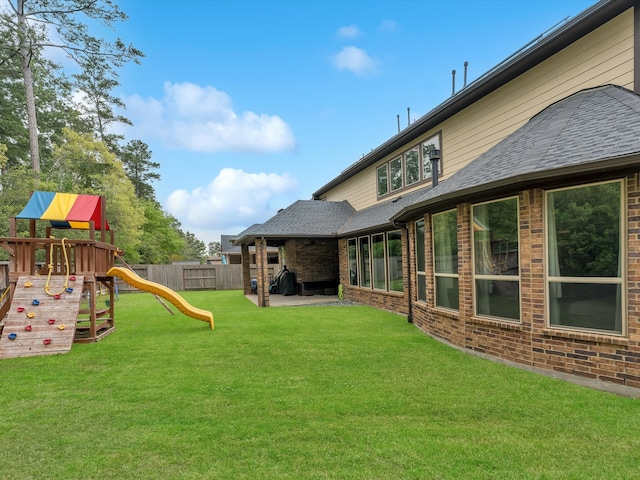 view of yard featuring a playground