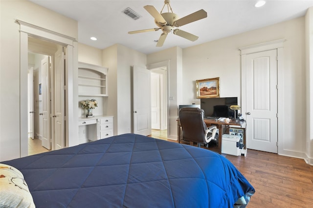 bedroom with wood-type flooring and ceiling fan